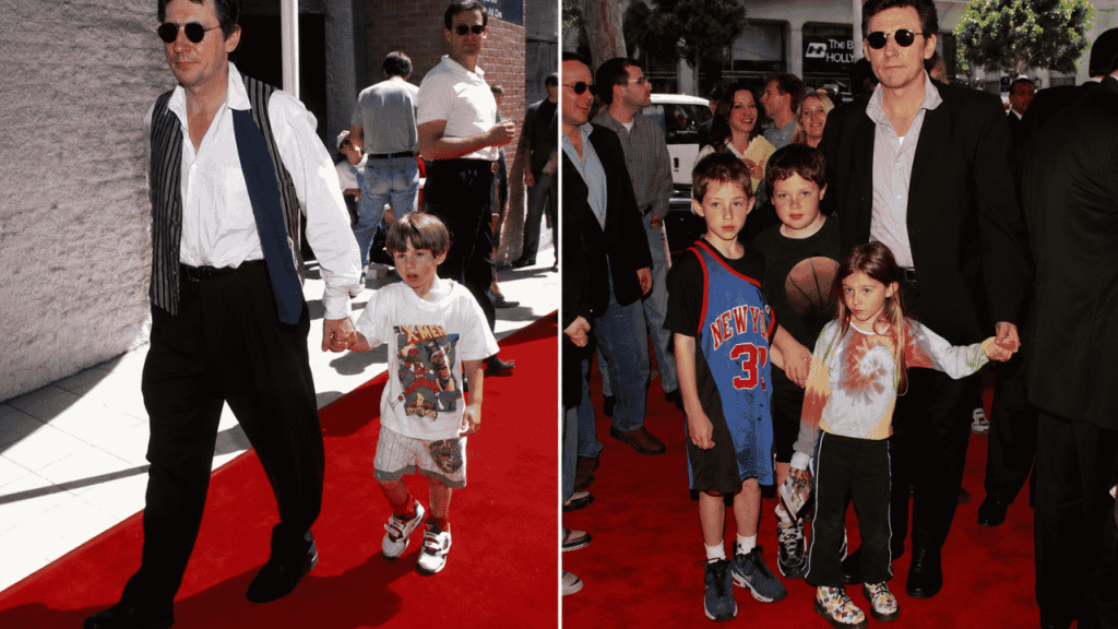 Gabriel Byrne with children at a red-carpet event